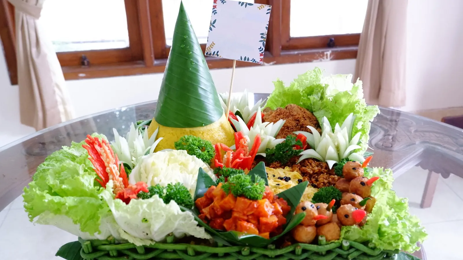 a table with a bowl of food on top of it